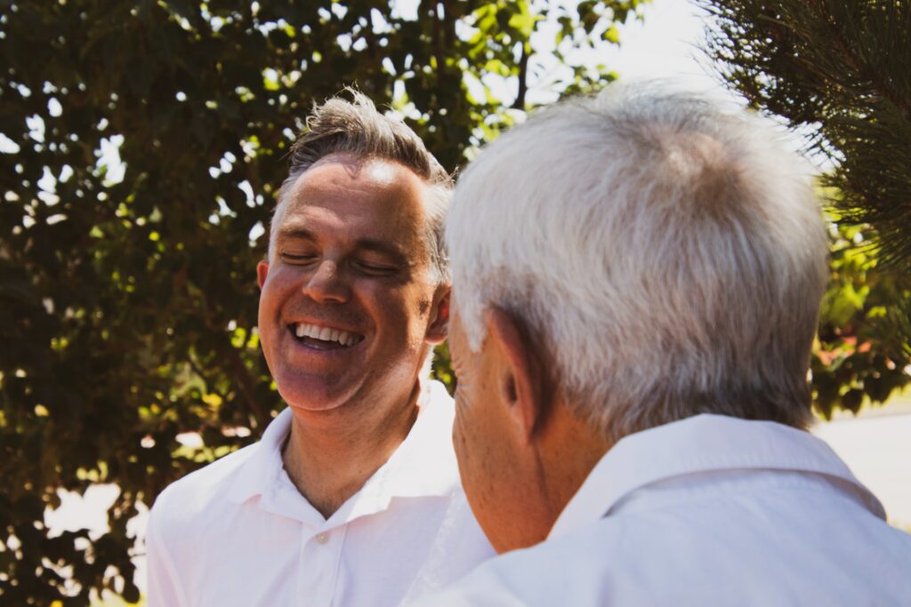 A father and son laughing